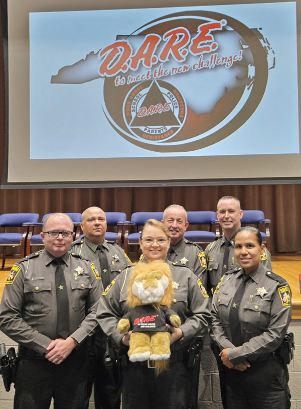 School resource officer supervisor and three SROs graduate DARE Officer training