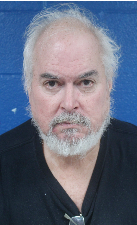 Father charged with shooting son