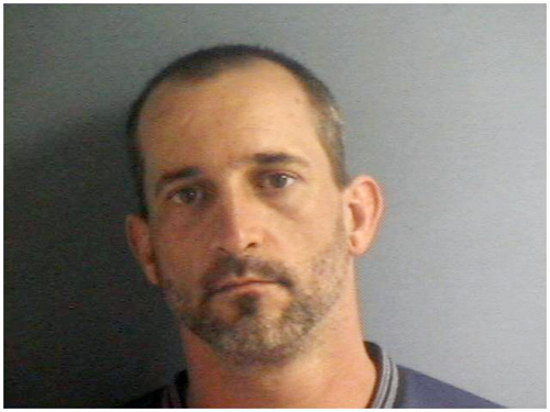 Local man charged with breaking and entering