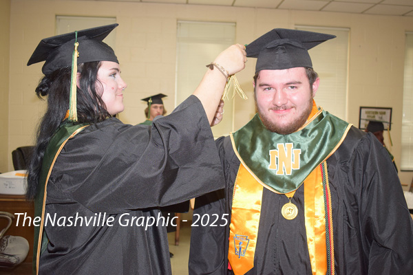 STUDENTS TURN TASSELS