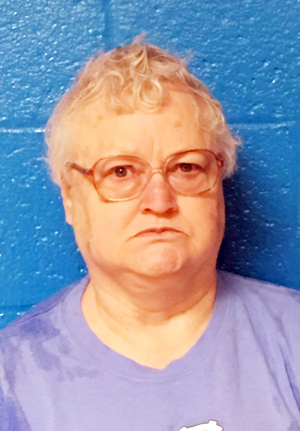 Woman charged with concealing death