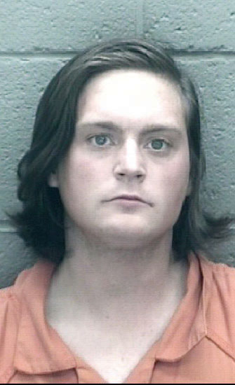 Suspect charged with homicide