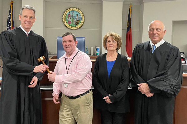 Long-time Magistrate hands over gavel