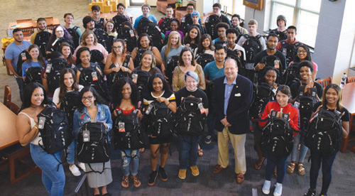 Laptops and backpacks distributed