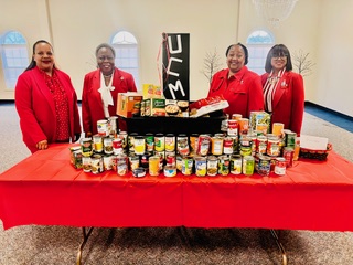 Sorority kicks off year with donations for shelter