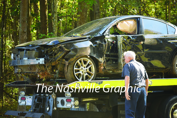 Car wrecks in woods