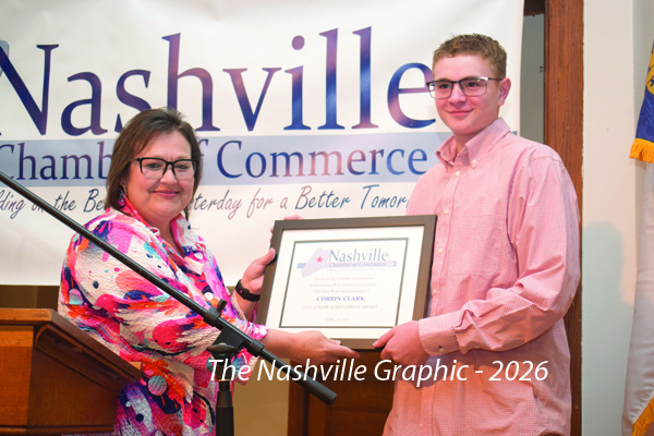 CLARK RECEIVES JUNIOR ACHIEVEMENT AWARD