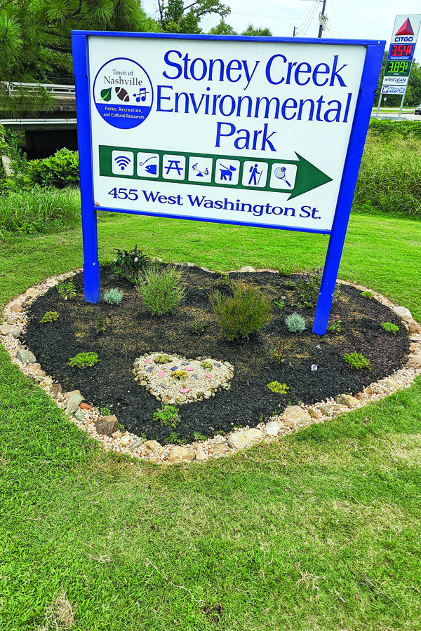 Local woman builds rock garden at park