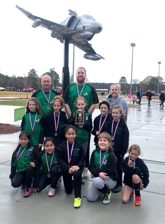 Soccer squads claim crowns