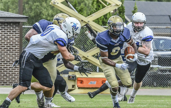 Wesleyan Outlasts TMC