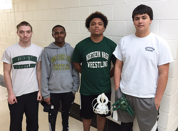 FOUR ON THE MAT